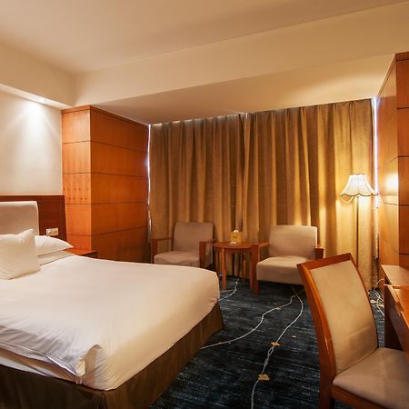 Gloria Plaza Hotel Kangqiao Шанхай Экстерьер фото