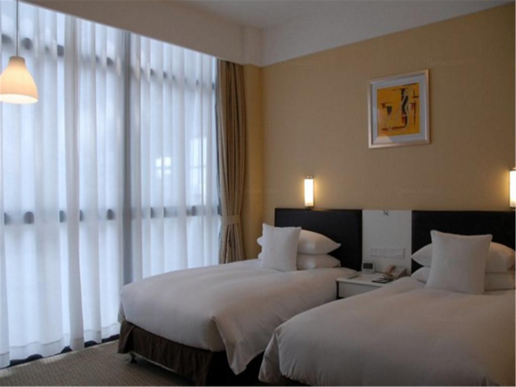 Gloria Plaza Hotel Kangqiao Шанхай Экстерьер фото