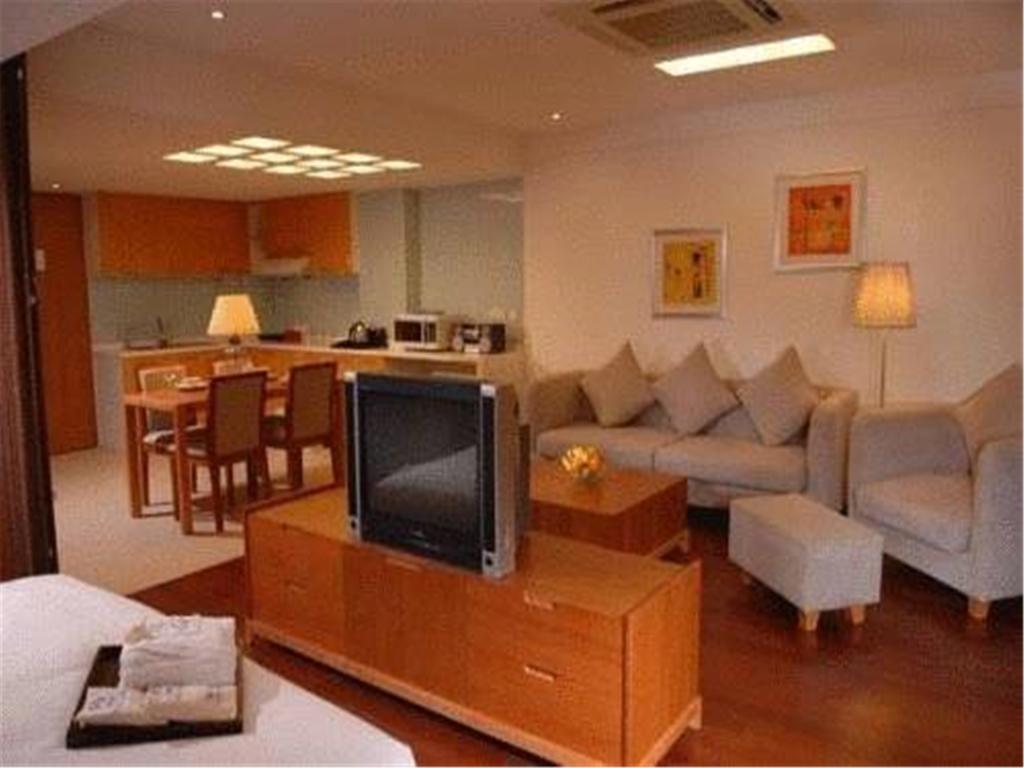 Gloria Plaza Hotel Kangqiao Шанхай Номер фото
