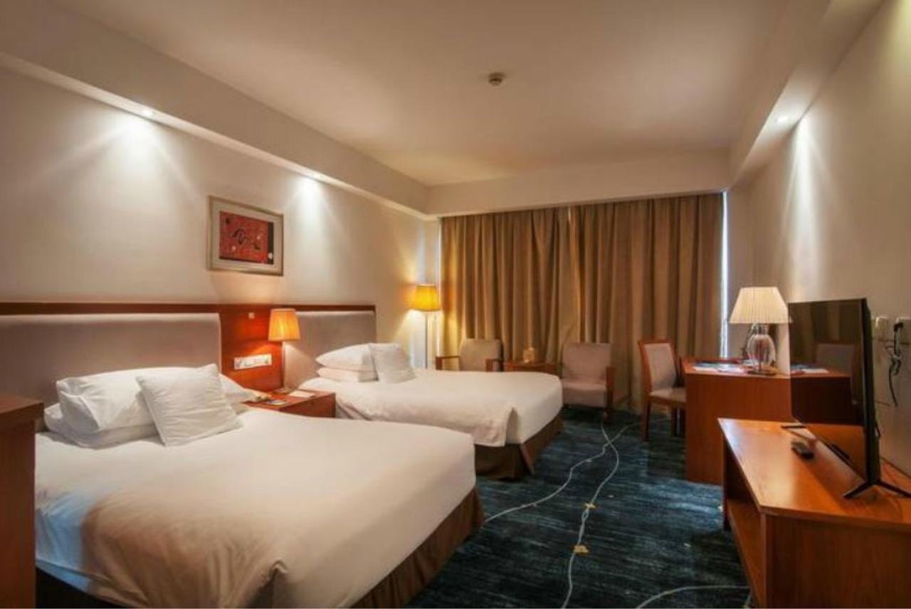 Gloria Plaza Hotel Kangqiao Шанхай Экстерьер фото