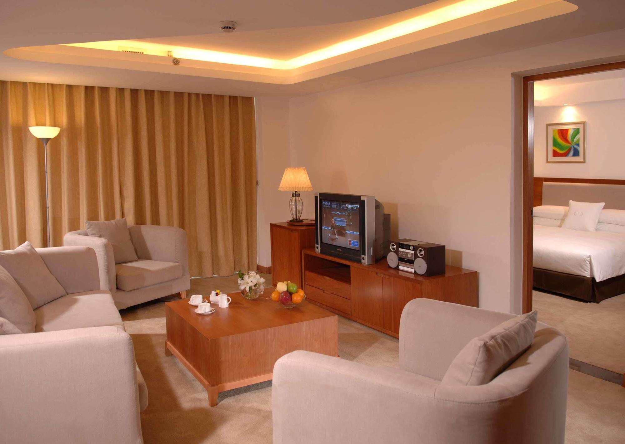Gloria Plaza Hotel Kangqiao Шанхай Номер фото