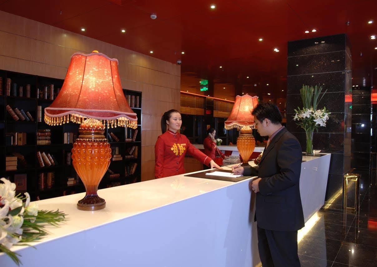 Gloria Plaza Hotel Kangqiao Шанхай Интерьер фото